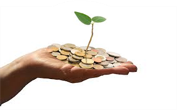 Whitney leaning against a railing on a downtown street