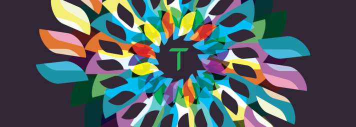 Whitney leaning against a railing on a downtown street